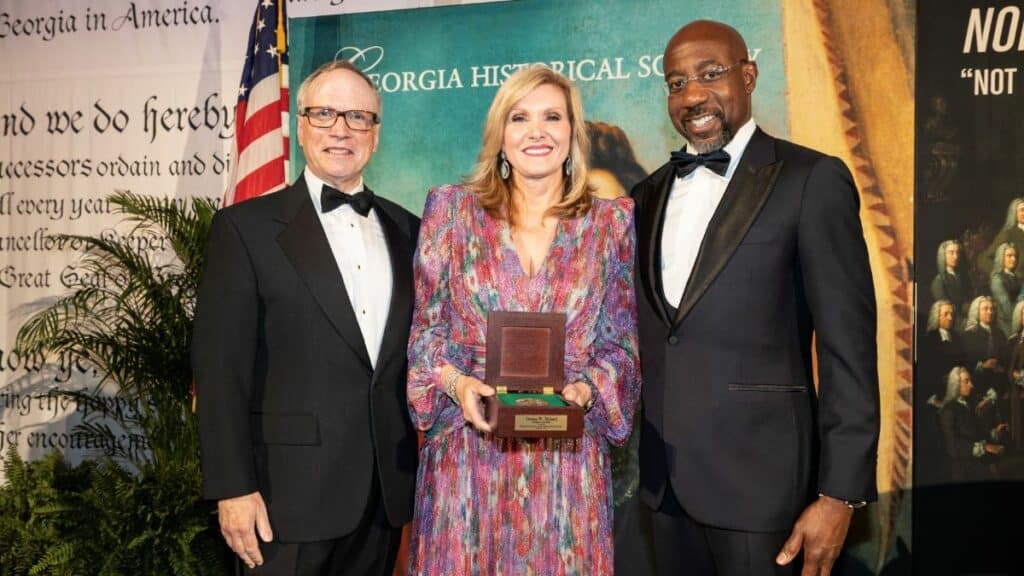 (L-R) Dr. W. Todd Groce, Donna Hyland, US Senator Reverend Raphael Warnock