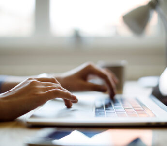 hands using a laptop